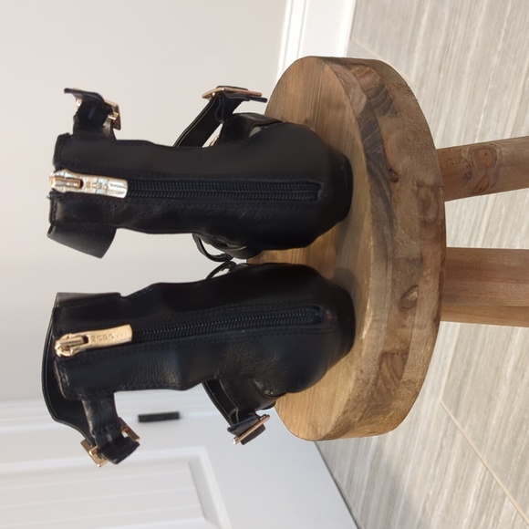 BCBG Generation Black Leather and Gold Gladiator Sandals - Picture 4 of 7